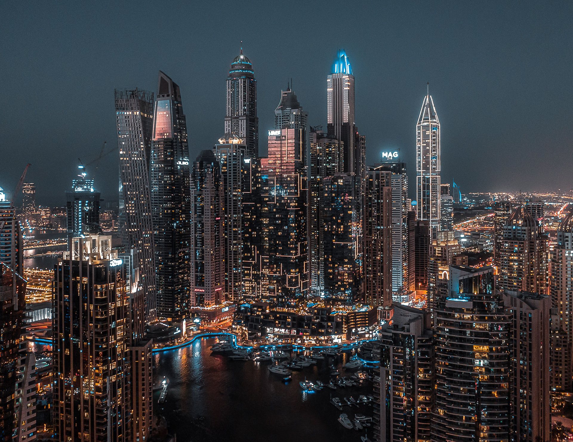 Dubai's high-rise coastline and marina at night
